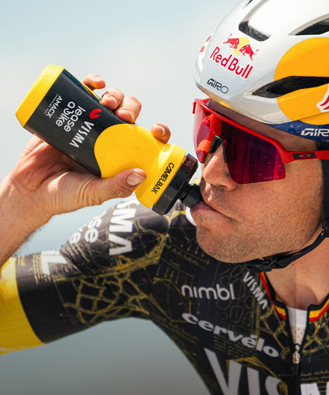Team Visma | Lease a Bike rider drinking from a bidon